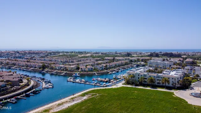 an aerial view of a city with lots of residential buildings