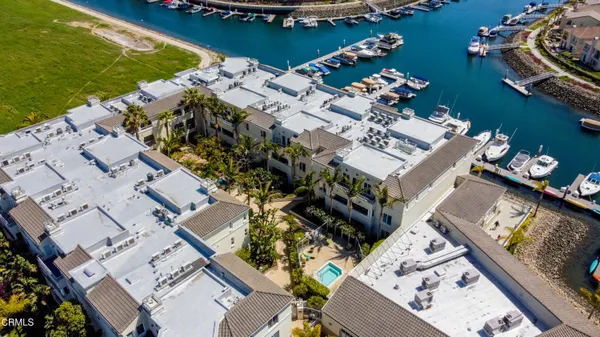 an aerial view of a house with a ocean view