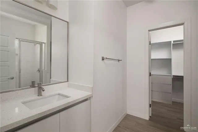 a bathroom with a sink and a mirror