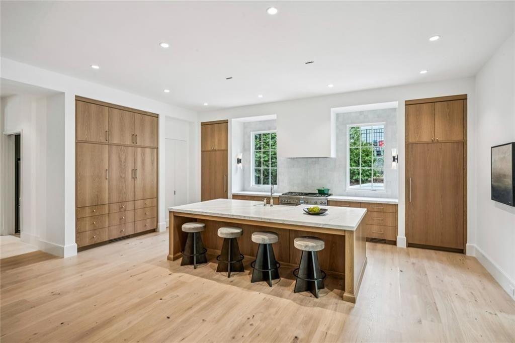 3167 Rilman Road Northwest Atlanta, GA 30327 - Photo 15 of 52 a room with a table and a window