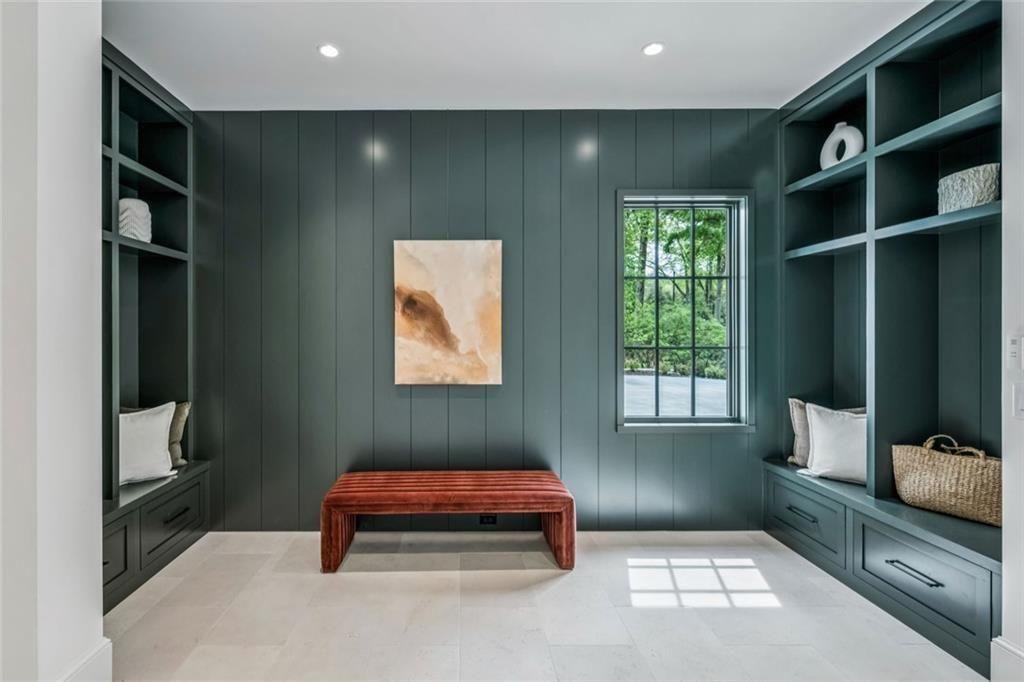 3167 Rilman Road Northwest Atlanta, GA 30327 - Photo 21 of 52 a bedroom with a bed and a window