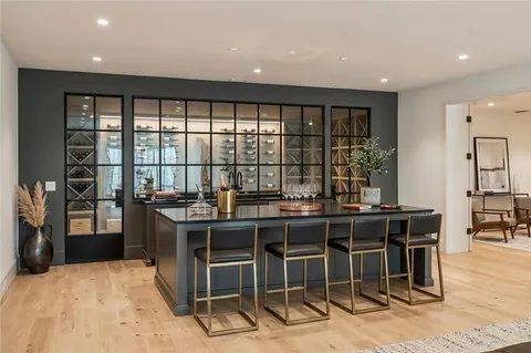 a view of a dining table and chairs in a room