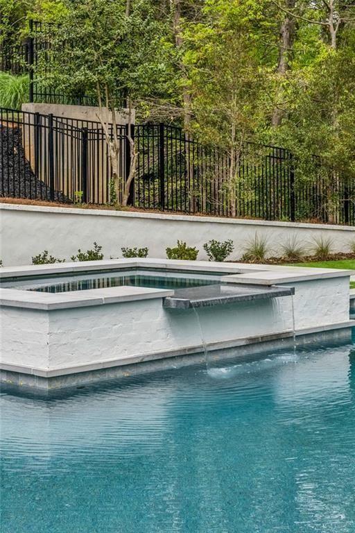 3167 Rilman Road Northwest Atlanta, GA 30327 - Photo 49 of 52 a view of swimming pool and a yard