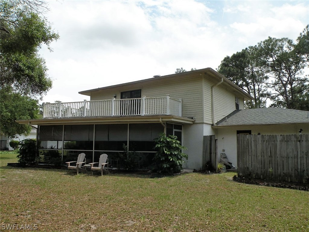 17571 Frank Road Alva, FL 33920 - Photo 4 of 13 a view of a house with backyard and sitting area