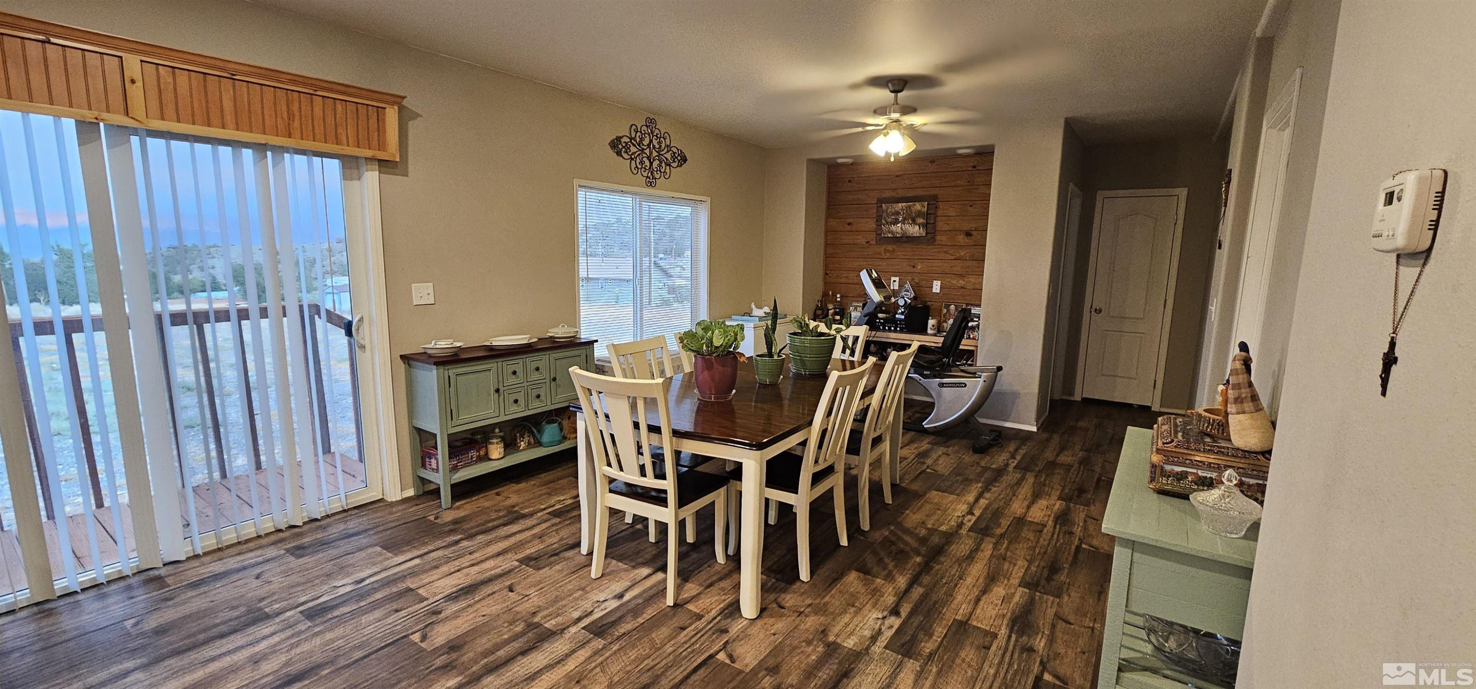 116 Victorine Drive Kingston, NV 89310 - Photo 13 of 25 a dining room with furniture window and wooden floor