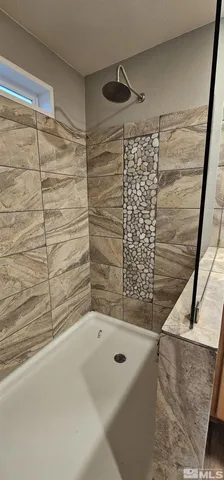 a bathroom with a toilet and a sink