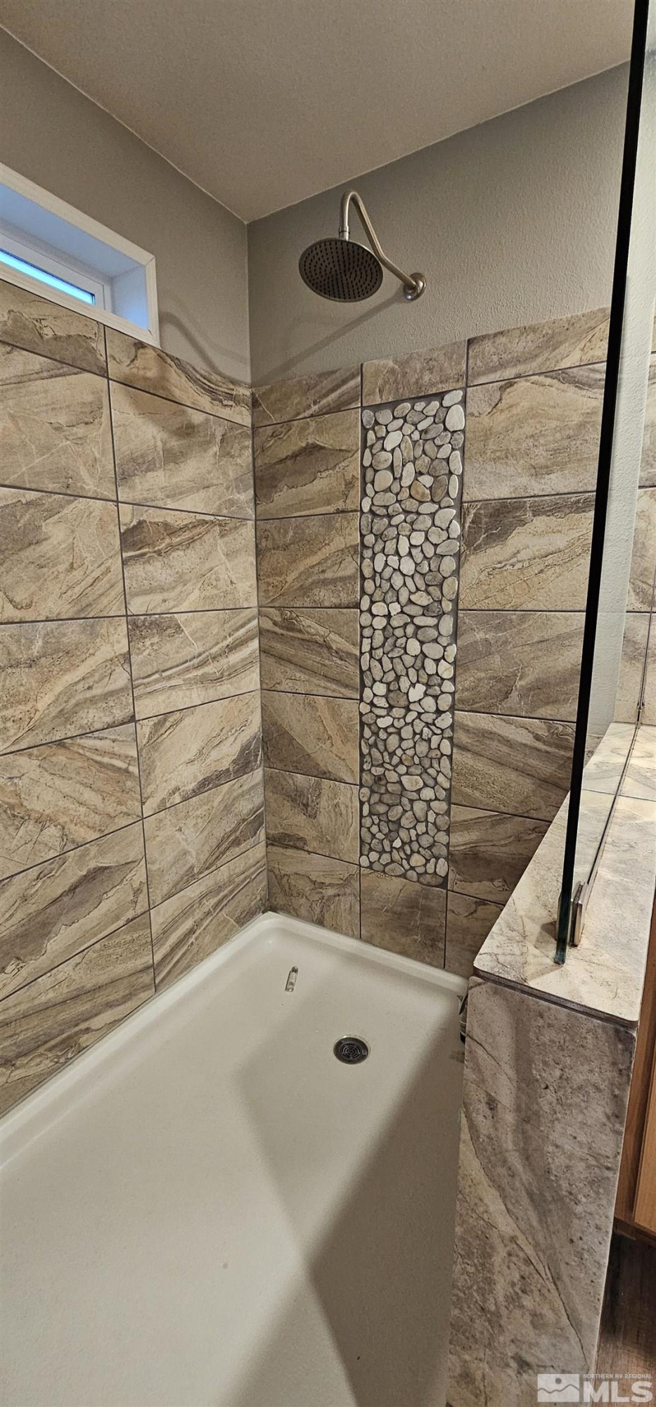 116 Victorine Drive Kingston, NV 89310 - Photo 19 of 25 a bathroom with a bathtub and shower