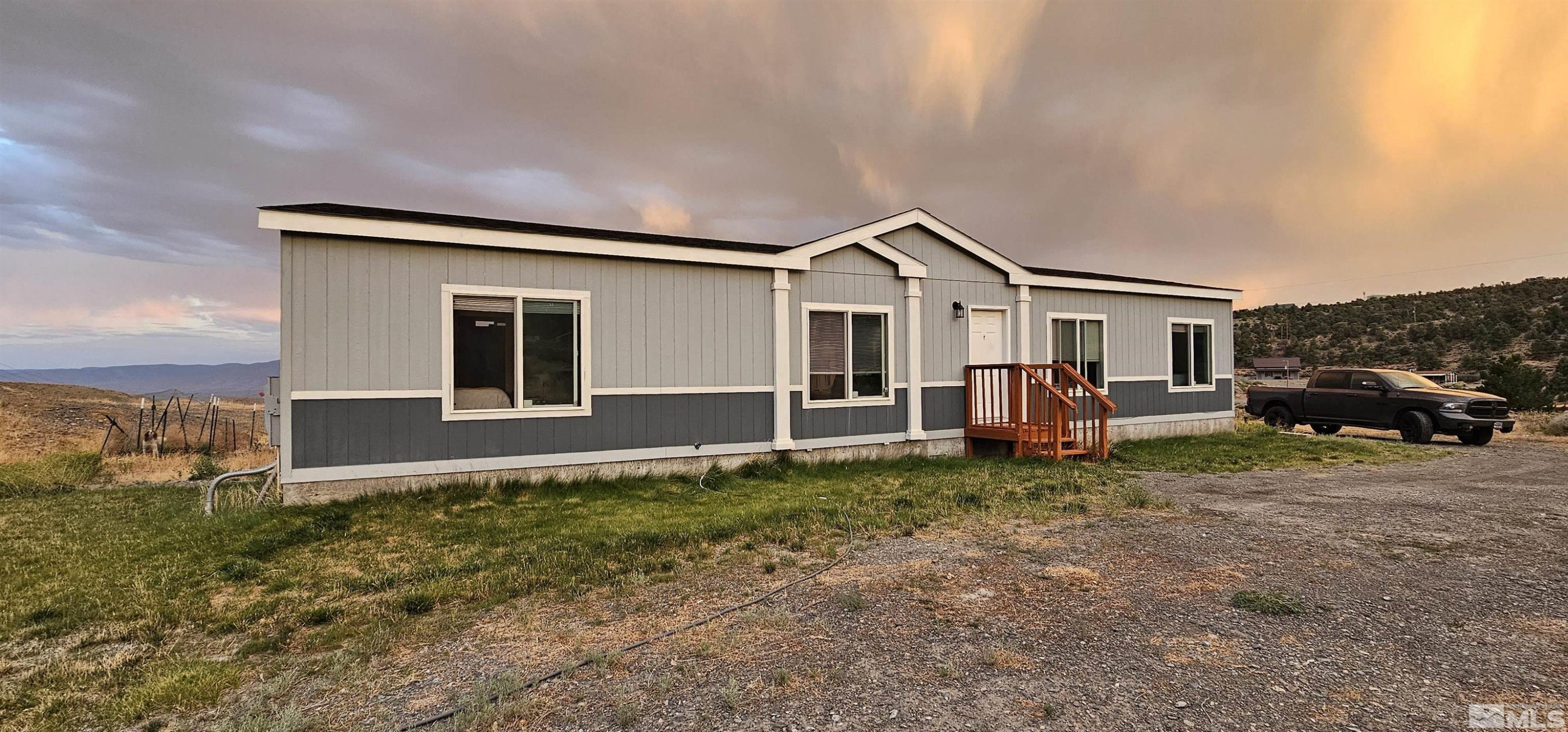 116 Victorine Drive Kingston, NV 89310 - Photo 25 of 25 a view of a house with backyard porch and garden