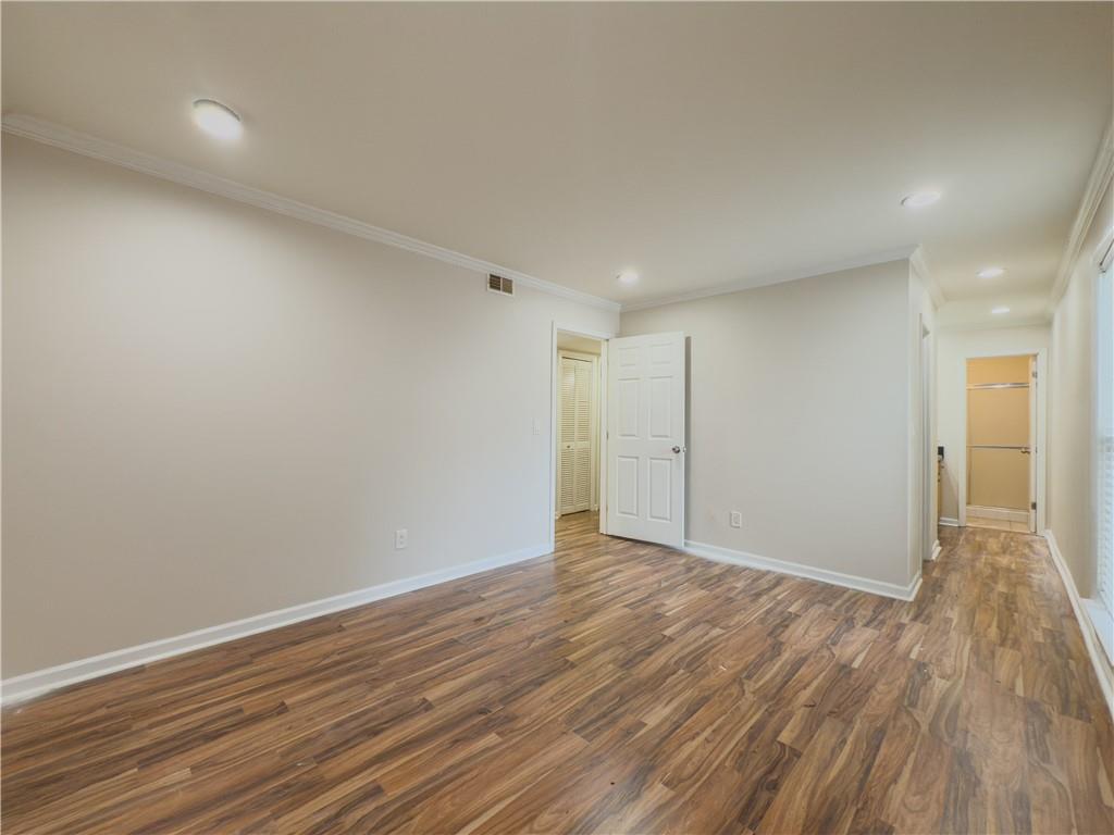 3301 Henderson Mill Road, Unit D3 Atlanta, GA 30341 - Photo 11 of 32 a view of an empty room with wooden floor
