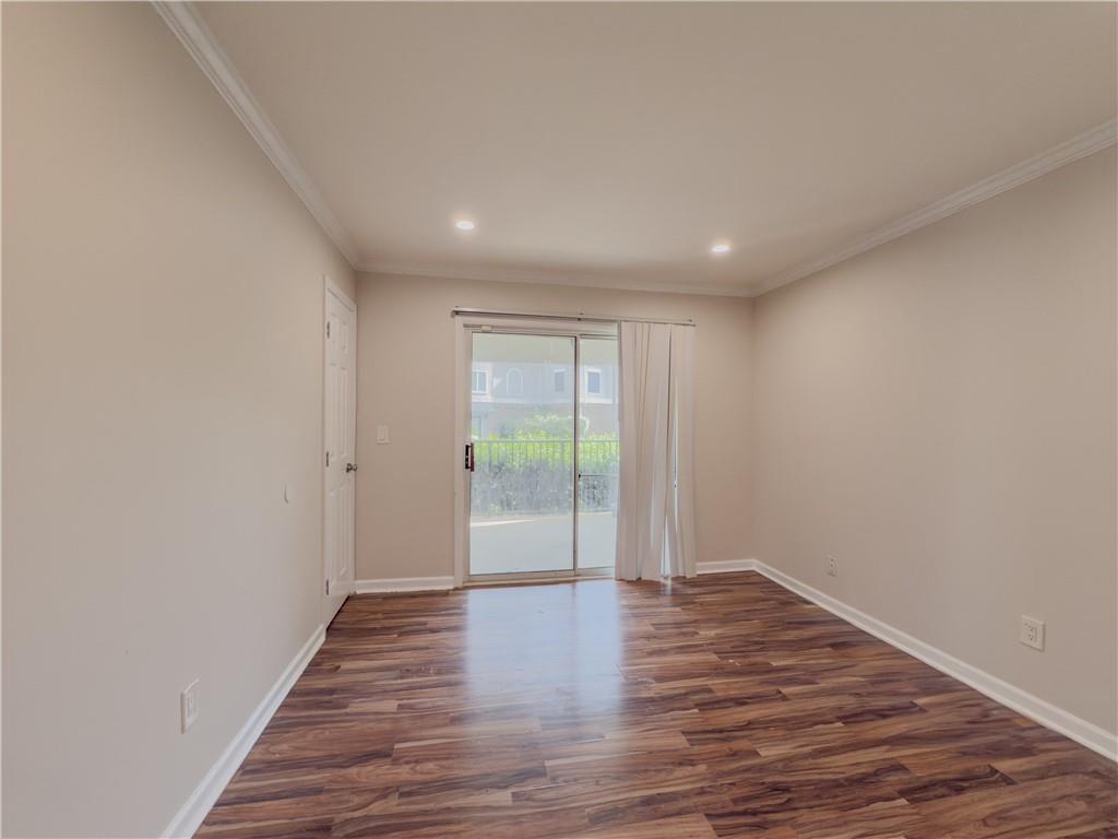 3301 Henderson Mill Road, Unit D3 Atlanta, GA 30341 - Photo 19 of 32 a view of an empty room with wooden floor