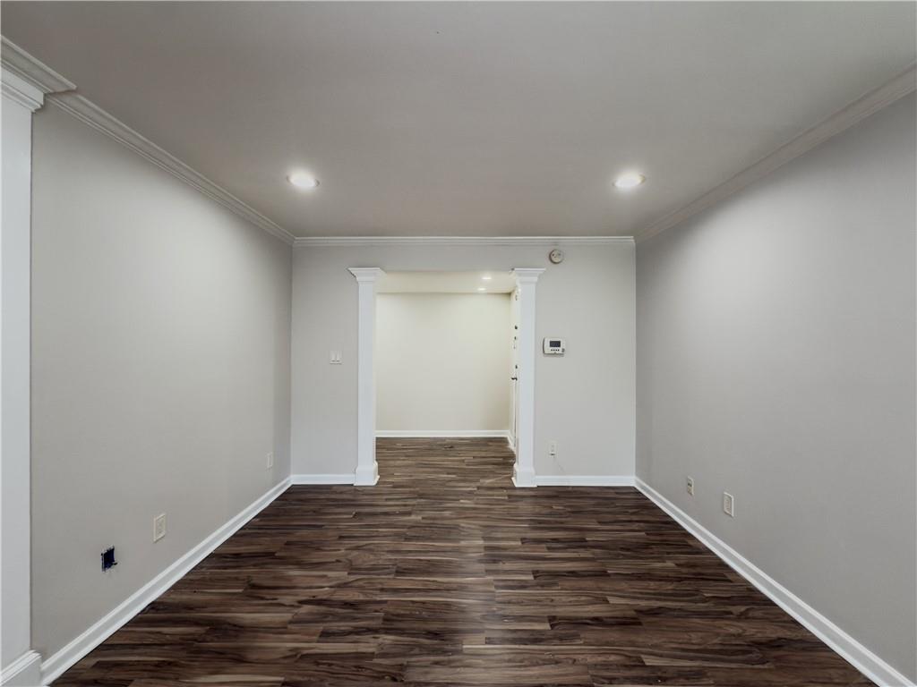 3301 Henderson Mill Road, Unit D3 Atlanta, GA 30341 - Photo 4 of 32 a view of an empty room with wooden floor