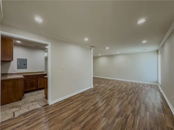 a view of a kitchen from the hallway