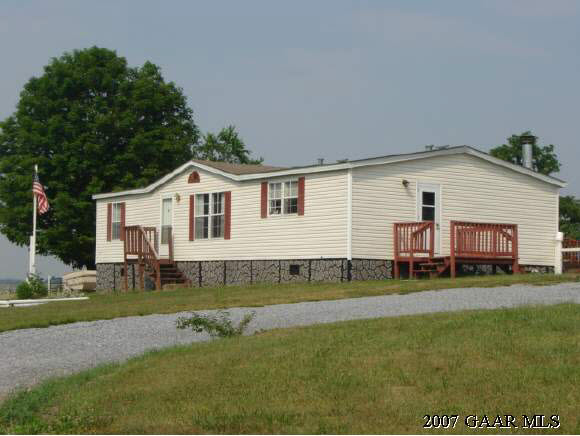 766 Patterson Mill Road Grottoes, VA 24441 - Photo 1 of 7 a front view of a house with a yard