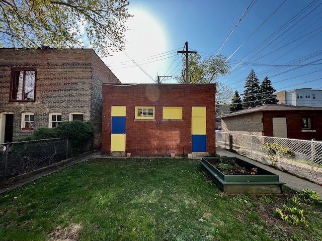 Undisclosed Address Chicago, IL 60647 - Photo 30 of 31 a front view of house with yard