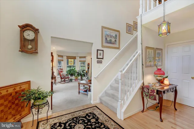 a view of entryway livingroom and hall