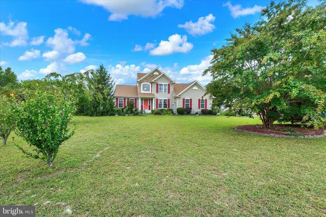 a view of a house with a big yard