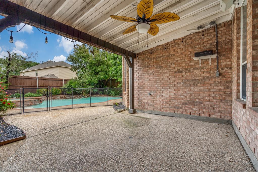 3421 Neiman Road Plano, TX 75025 - Photo 33 of 40 Fenced backyard featuring a ceiling fan and a patio
