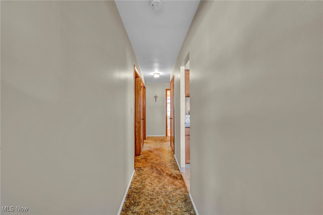 13732 Carpenter Road Garfield Heights, OH 44125 - Photo 16 of 46 Corridor with baseboards