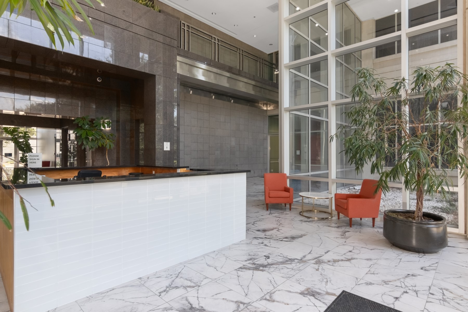 9800 Centre Parkway, Unit 1003 Houston, TX 77036 - Photo 19 of 29 a view of a patio with dining table and chairs potted plants