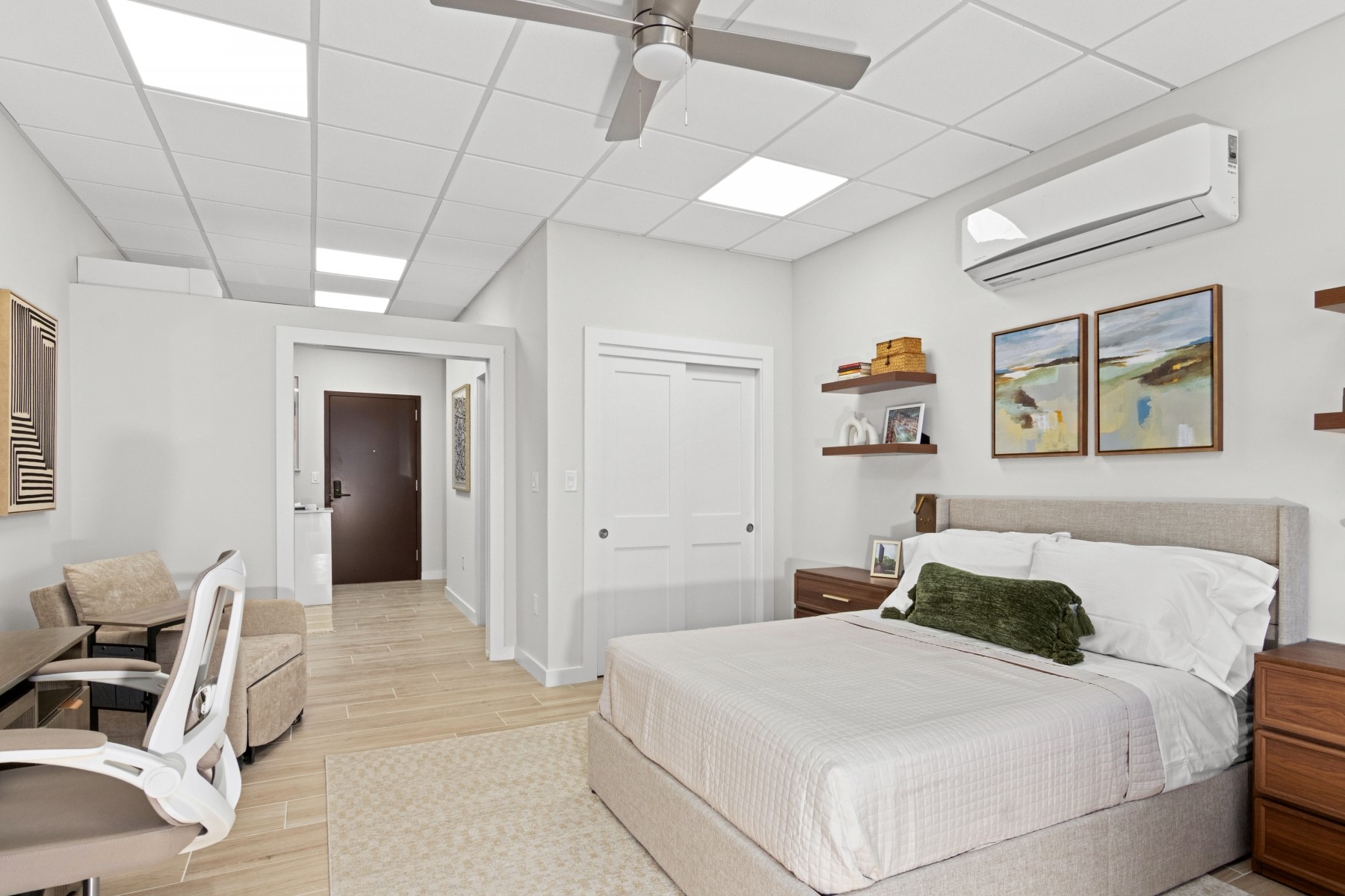 9800 Centre Parkway, Unit 1003 Houston, TX 77036 - Photo 5 of 29 a bedroom with a large bed and a chandelier