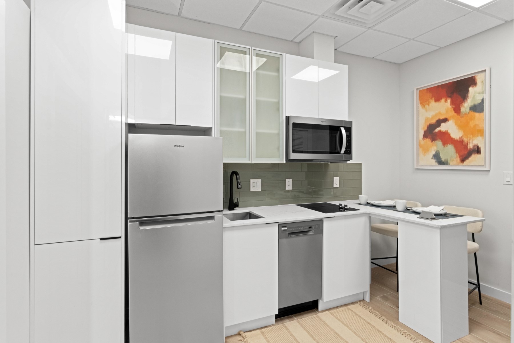 9800 Centre Parkway, Unit 1003 Houston, TX 77036 - Photo 7 of 29 a view of a kitchen with a sink and cabinets