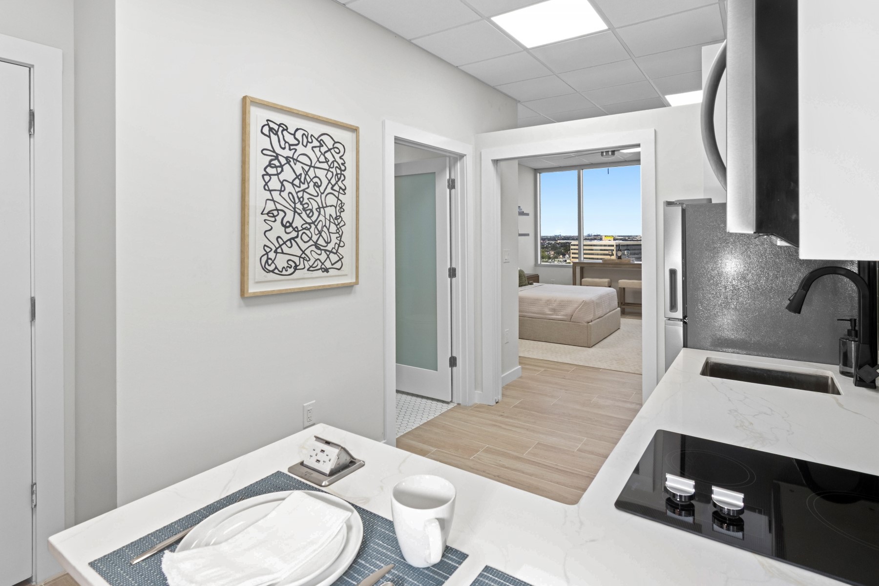 9800 Centre Parkway, Unit 1003 Houston, TX 77036 - Photo 9 of 29 a living room with furniture and a wooden floor