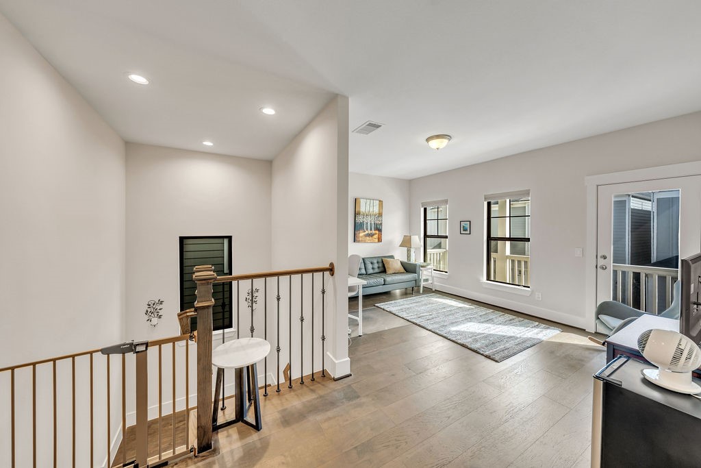 3510 Huntsford Drive Houston, TX 77008 - Photo 16 of 34 a view of an empty room with stairs and a window