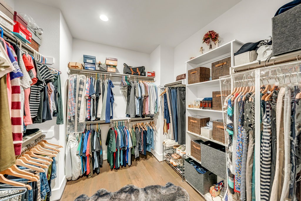 3510 Huntsford Drive Houston, TX 77008 - Photo 25 of 34 a view of walk in closet with clothes and shoes