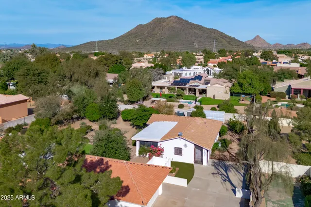 a view of a room with window and stairs