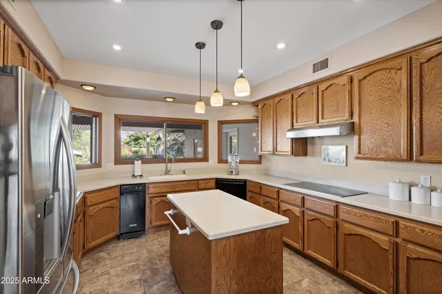 a view of entryway and hall with a couch