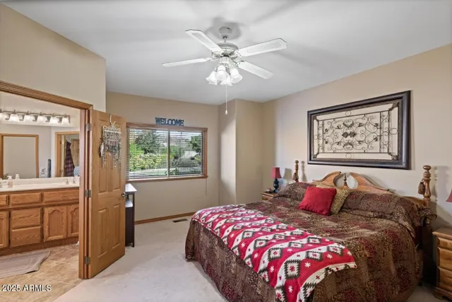 a bathroom with a shower sink and mirror