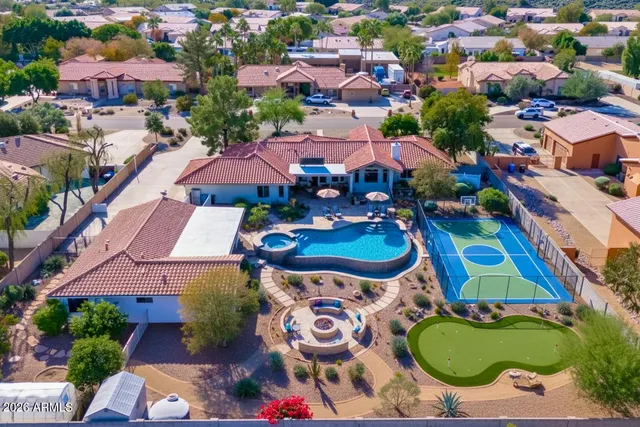 an aerial view of a house with a garden