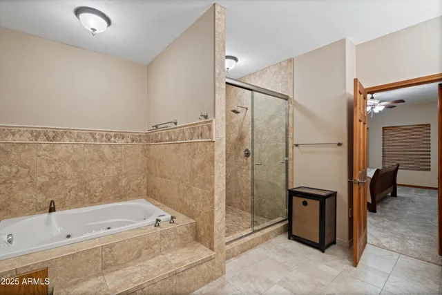 a view of a house with a tree in the background