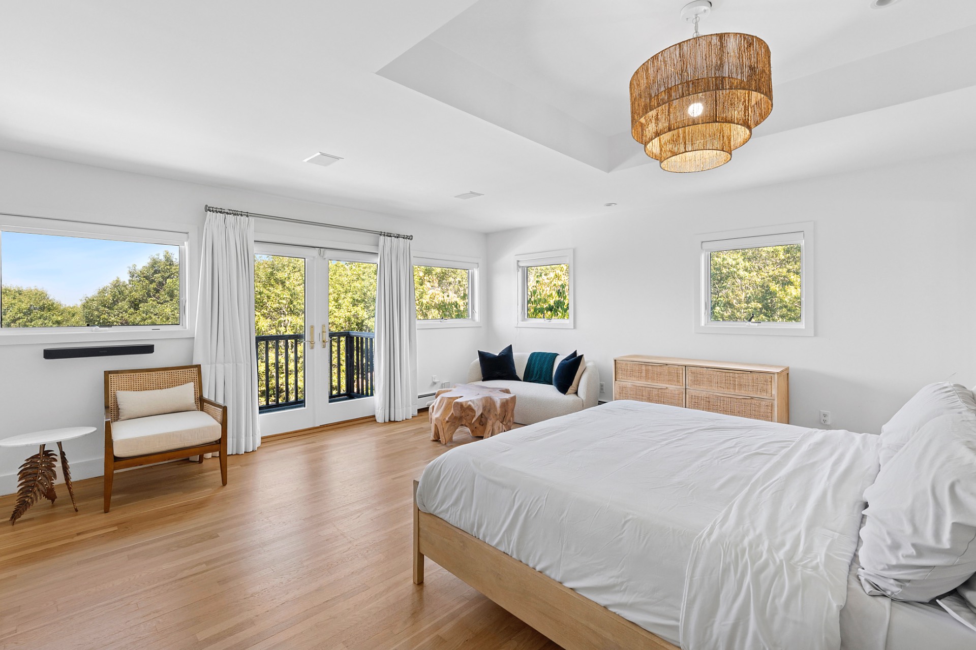 28 Deer Ridge Trail Water Mill, NY 11976 - Photo 11 of 23 a bedroom with a bed and a large window