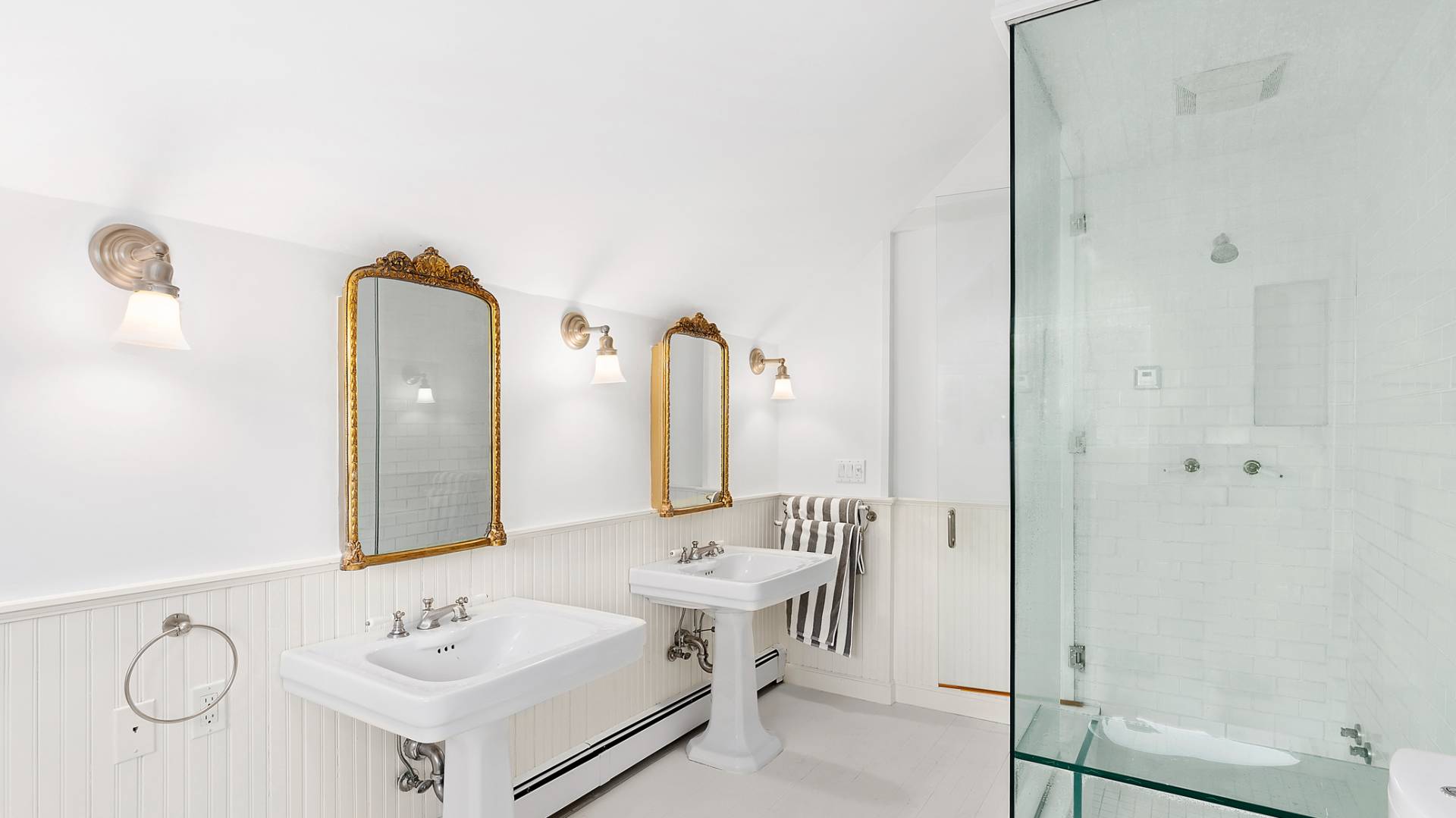 28 Deer Ridge Trail Water Mill, NY 11976 - Photo 13 of 23 a bathroom with a double vanity sink mirror and shower