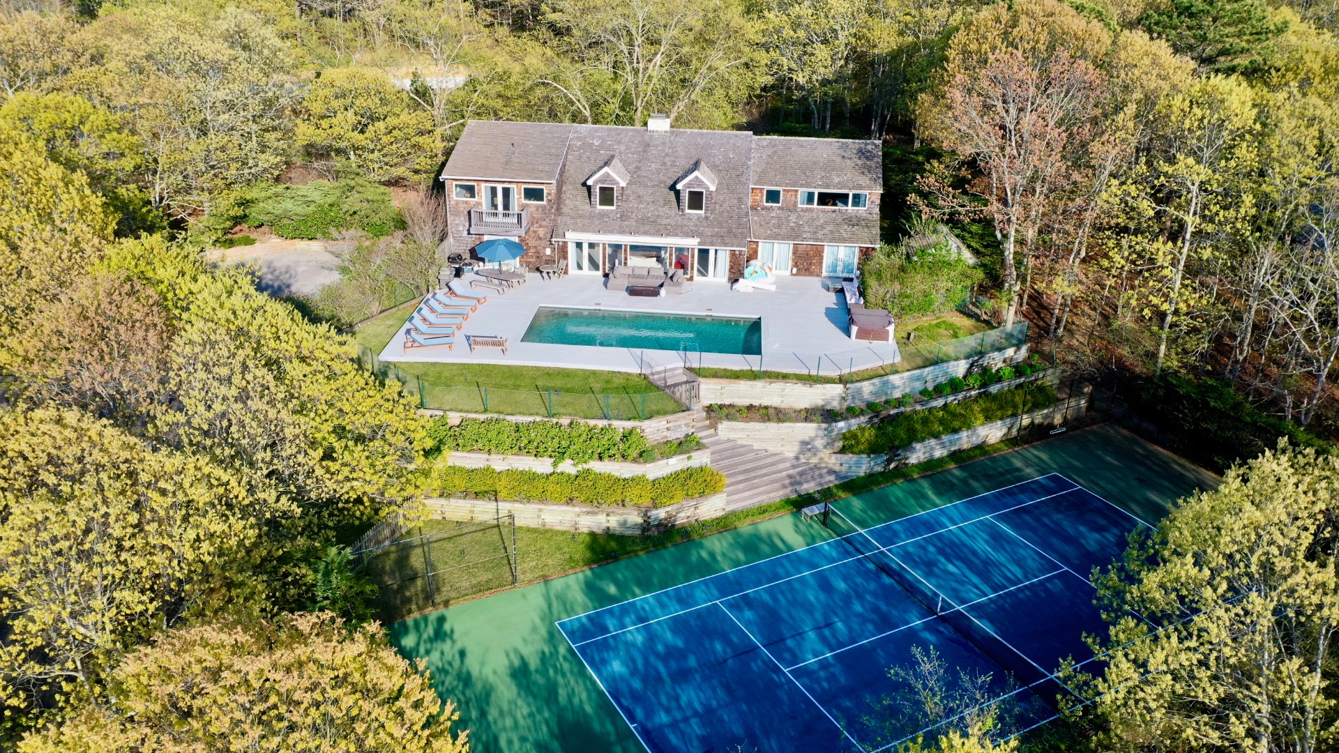 28 Deer Ridge Trail Water Mill, NY 11976 - Photo 22 of 23 a aerial view of a house with a yard