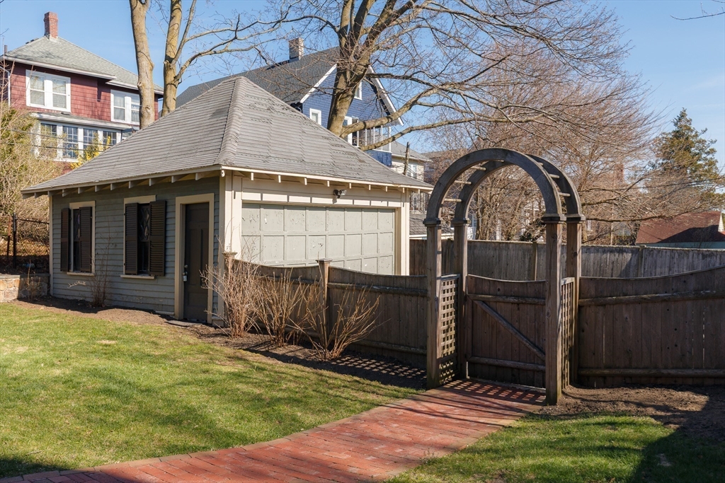 25 Barrington Road Boston, MA 02124 - Photo 30 of 33 a view of house with backyard