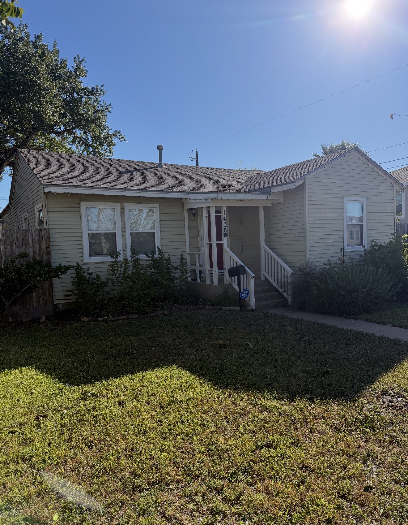 1406 Kirwin Street Galveston, TX 77551 - Photo 2 of 13 a view of a house with a yard