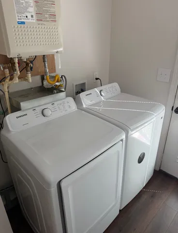 a utility room with dryer and washer