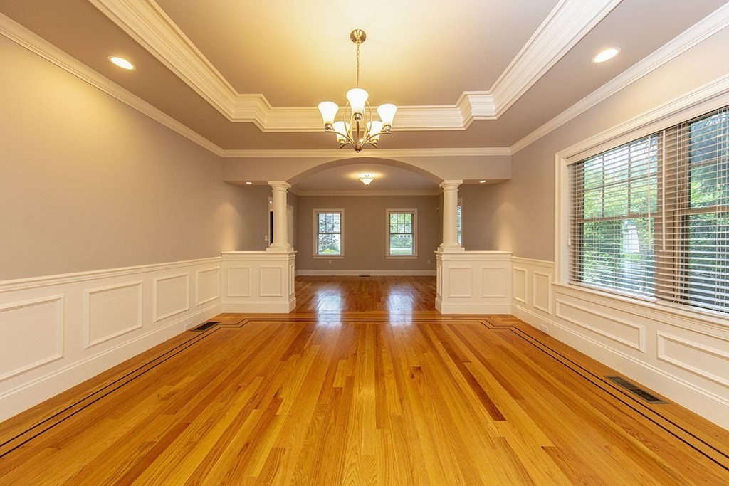 33 Liberty Avenue Lexington, MA 02420 - Photo 5 of 30 a view of an empty room with wooden floor and a window