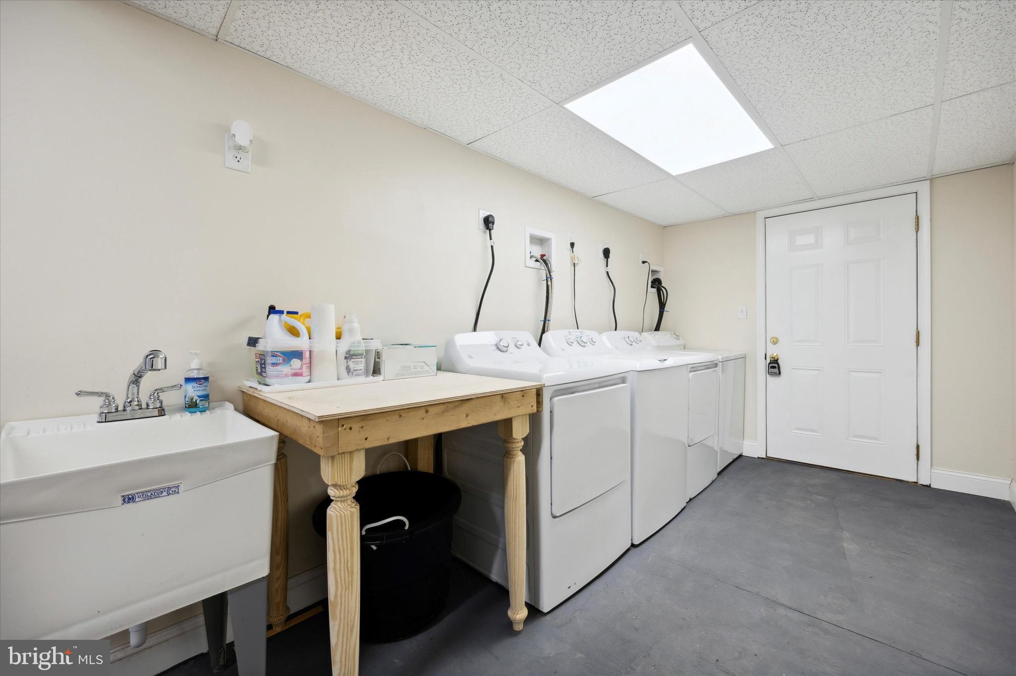 3 South Brandywine Avenue, Unit 3RD 6 Modena, PA 19320 - Photo 21 of 29 a utility room with cabinets washer and dryer