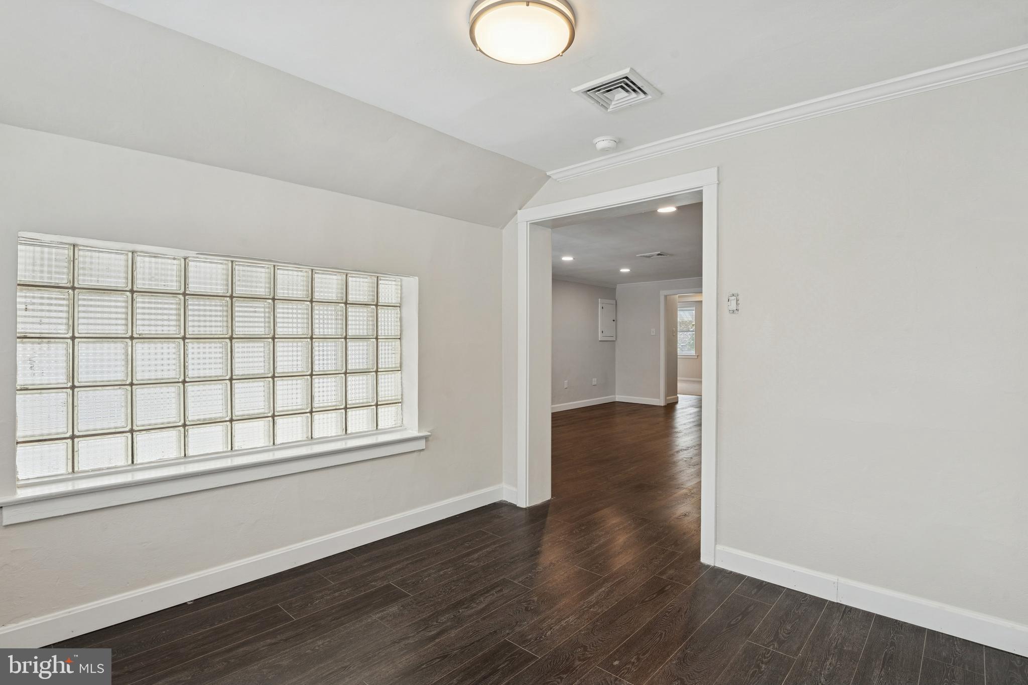 3 South Brandywine Avenue, Unit 3RD 6 Modena, PA 19320 - Photo 10 of 29 wooden floor in an empty room with a window