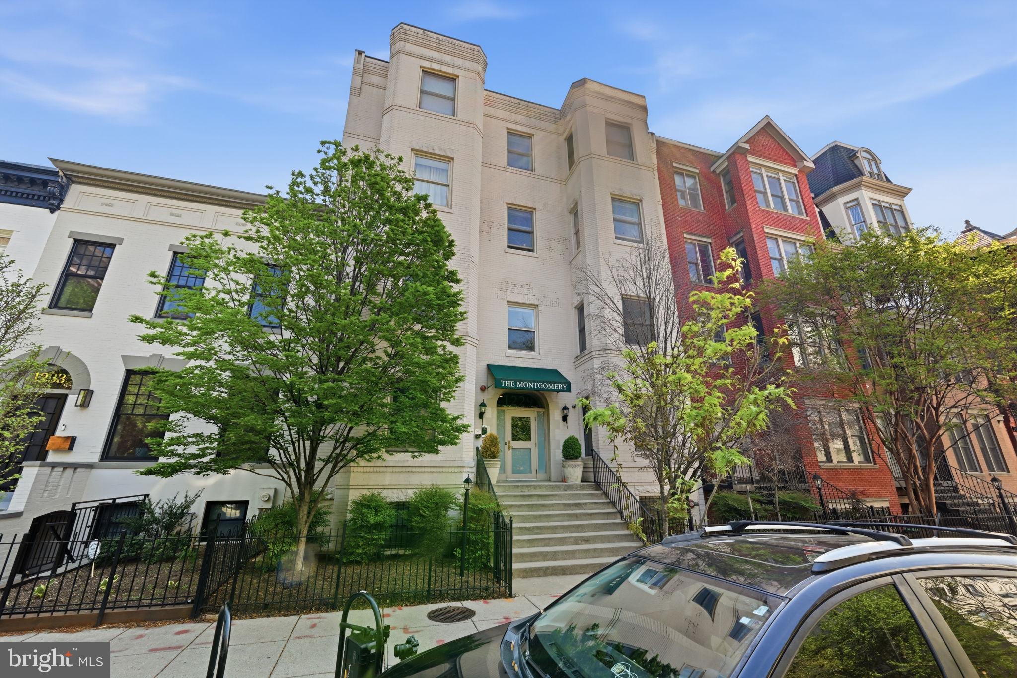 1229 12th Street Northwest, Unit 208 Washington, DC 20005 - Photo 1 of 35 front view of a building with a garden