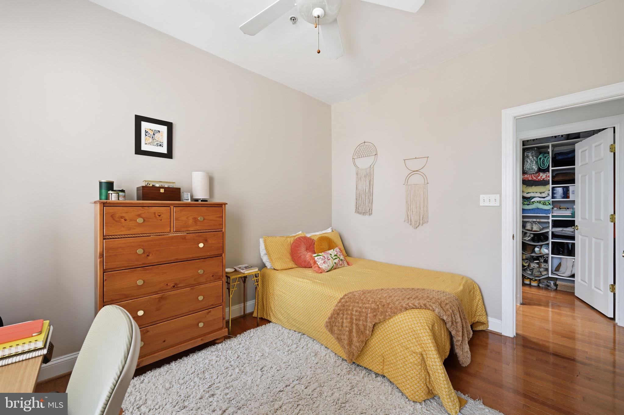 1229 12th Street Northwest, Unit 208 Washington, DC 20005 - Photo 20 of 35 a bedroom with a bed and furniture