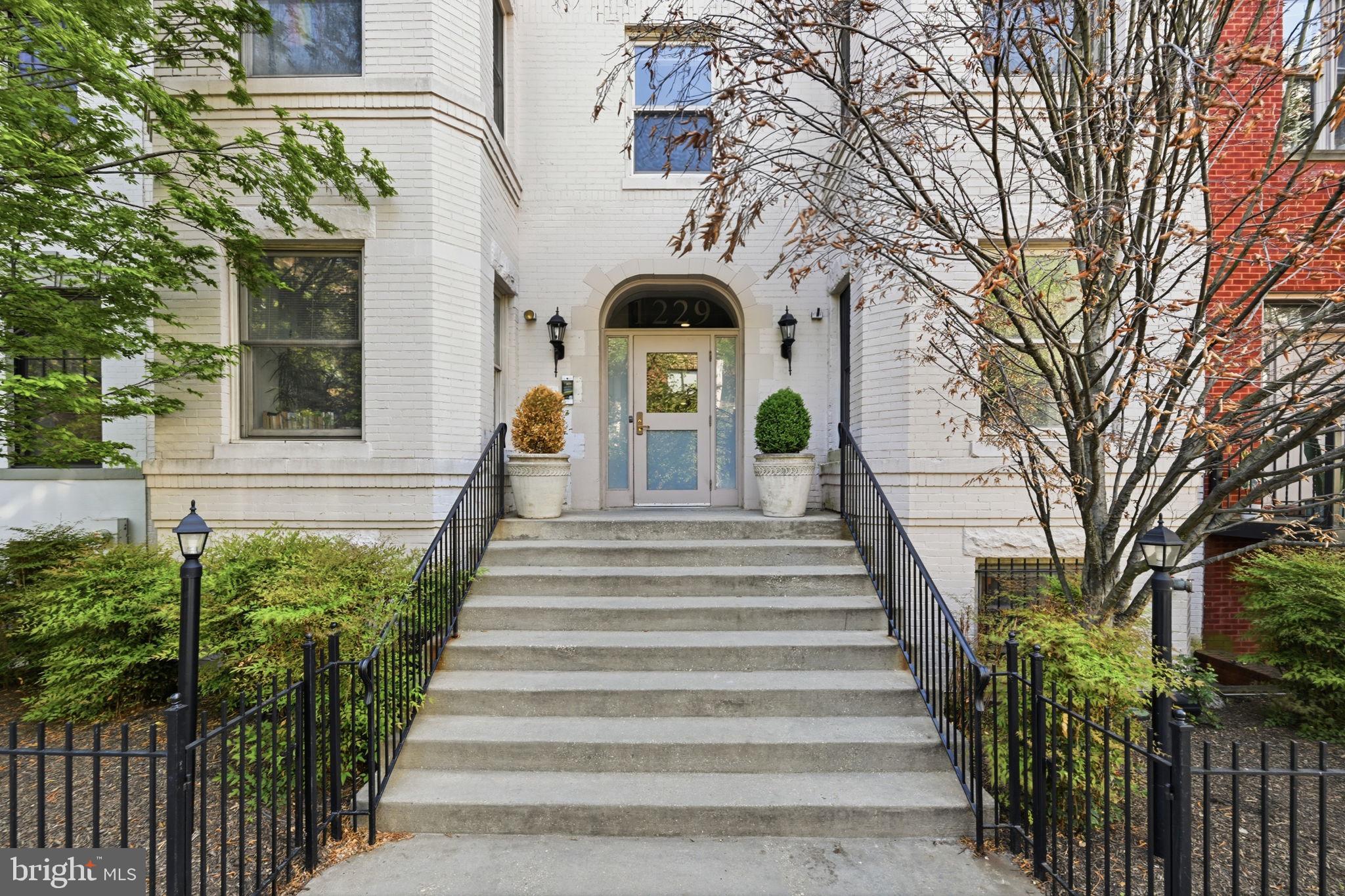 1229 12th Street Northwest, Unit 208 Washington, DC 20005 - Photo 35 of 35 a view of a building with large trees