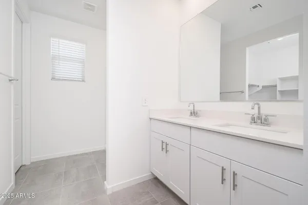 a bathroom with a sink and a vanity