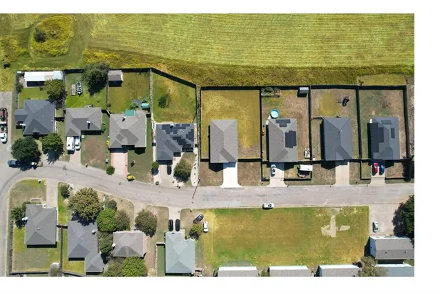 a bathroom with a sink mirror and bathtub