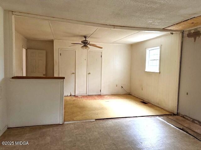 427 Gun Club Road Fort Valley, GA 31030 - Photo 2 of 12 an empty room with wooden floor and windows