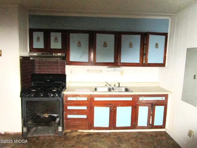 a bathroom with a sink a vanity and a mirror