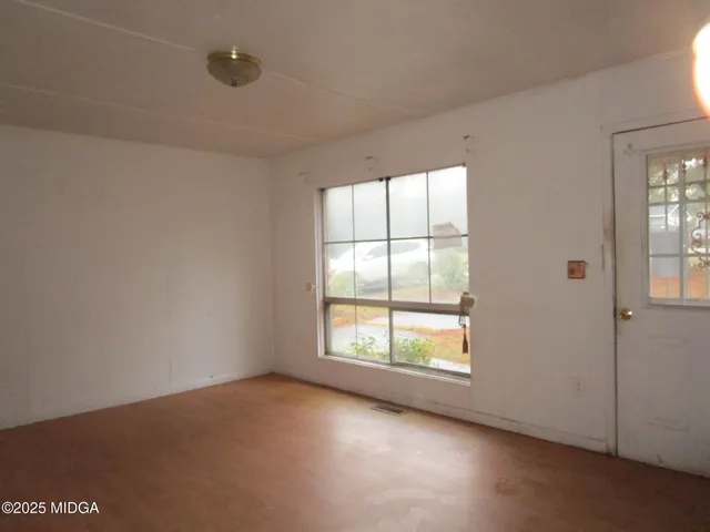 an empty room with windows